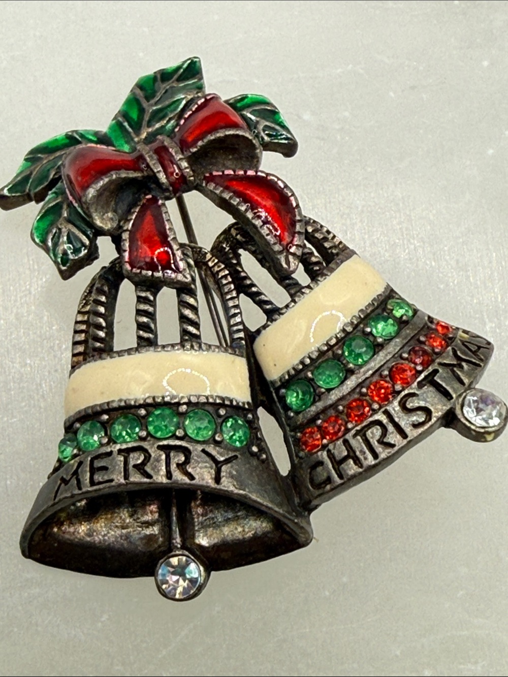 Vintage Merry Christmas Bell Brooch with Red & Green Enamel pin on pewter